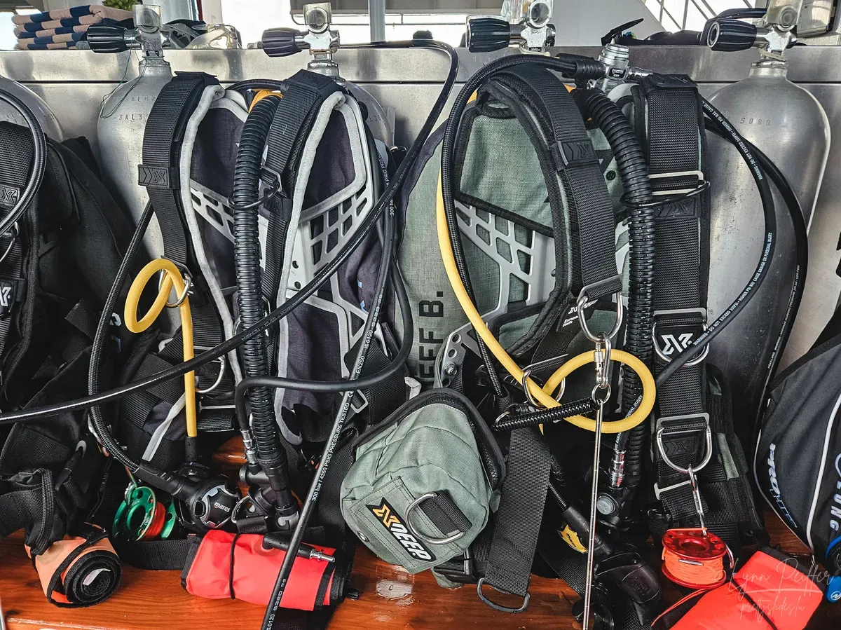 Diving Raja Ampat Indonesia Travel Photos 02 by Lynn Peiffer Diving equipment on scuba tanks aboard the White Manta liveaboard in Raja Ampat, Indonesia.