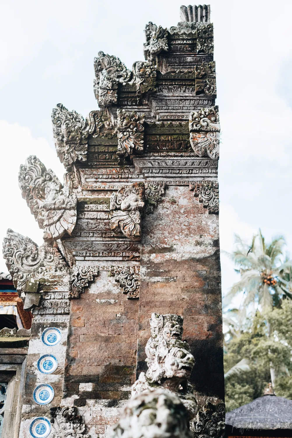 Places of Indonesia Landscape Travel Photos 24 by Lynn Peiffer One half of a carved stone temple gate in Bali, Indonesia.