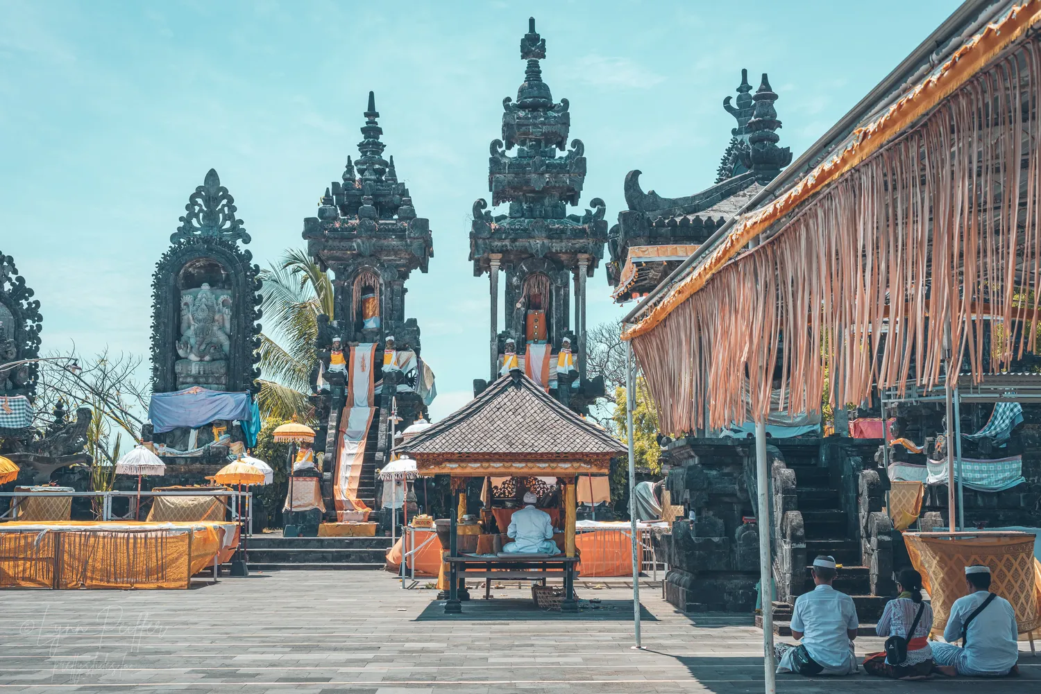 Places of Indonesia Landscape Travel Photos 30 by Lynn Peiffer Balinese pray at a Hindu temple in Bali, Indonesia.