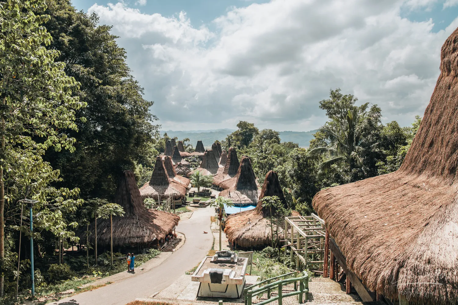 Places of Indonesia Landscape Travel Photos 42 by Lynn Peiffer A street lined with traditional Rumah Adat houses in Sumba, Indonesia.